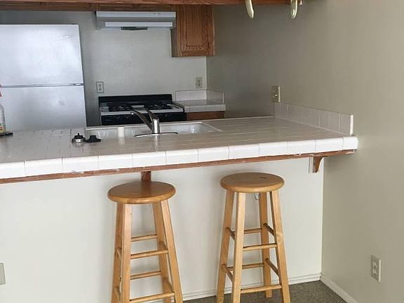 Kitchen includes Stove, Fridge, Dishwasher, Garbage Disposal