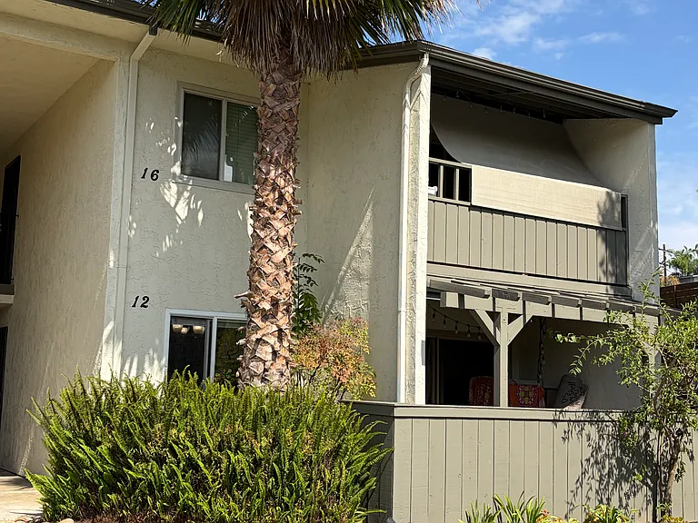 Bottom floor unit in back of small complex. No neighbors looking in from any window. Full privacy. Quiet. Recently repainted complex of 32 units. Assigned parking immediately in front of your front deck (that has a custom overhang).