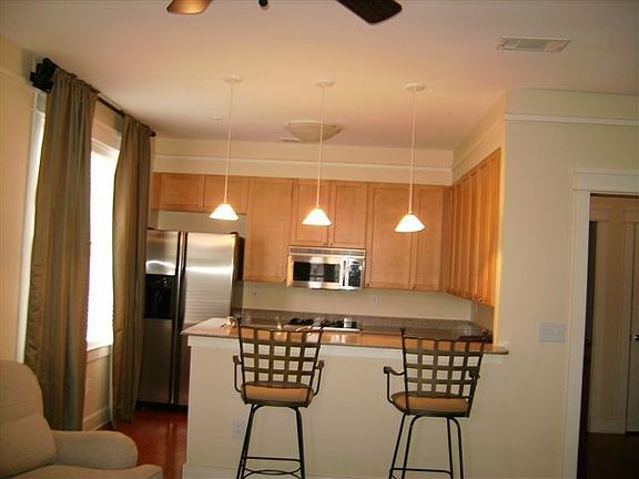 Kitchen w/ granite countertops, maple cabinets 