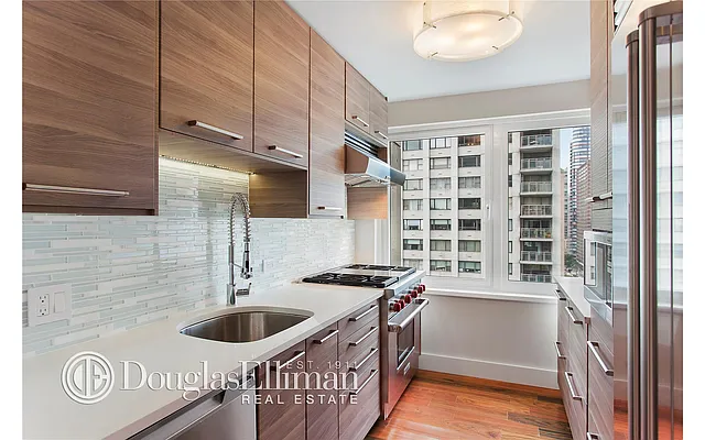 Sold by Douglas Elliman | media 9
