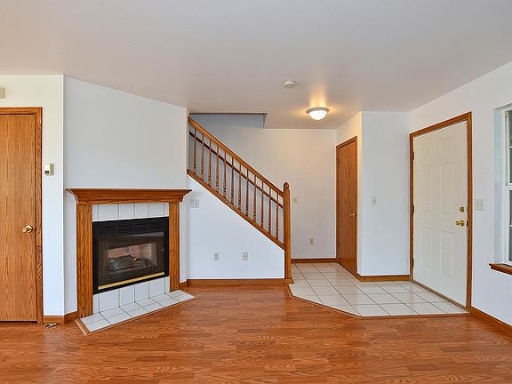 Main Floor Coat Closet, Main Entry & Gas Fireplace