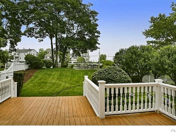 Azek Deck overlooking beautiful yard and views of the water