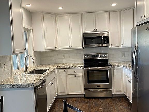 Cabinets and appliances are 