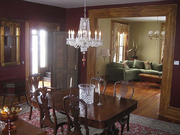 Custom moldings, large rooms : Custom moldings, wide hardwood cherry floors and lots of light and vi