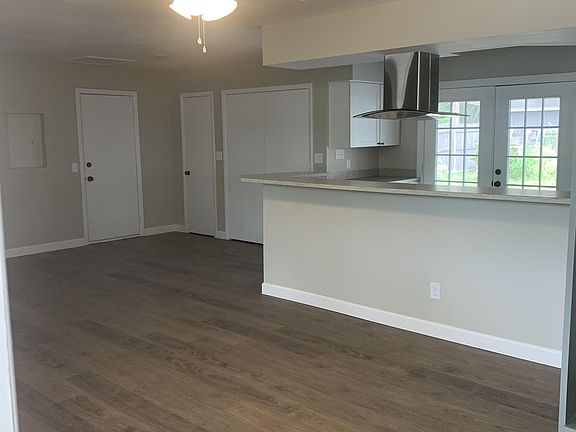 View from front door - open concept living/dining area