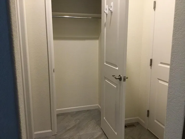 Closet just off garage entry area