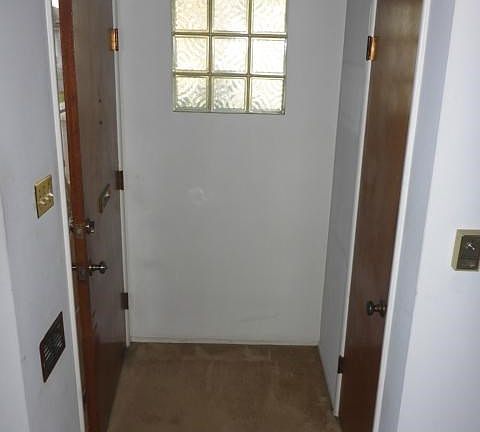 Front Door entry area with closet.