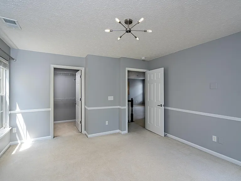 1st Bedroom upstairs with walk-in closet