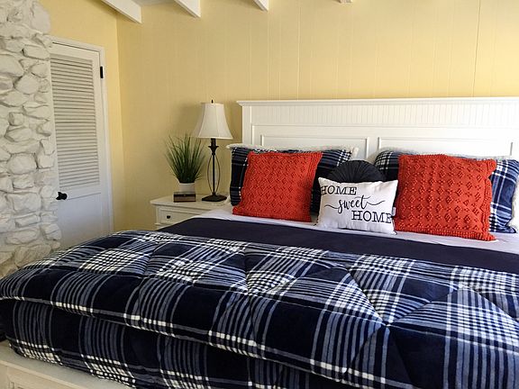 The master has a Cal King Bed and new bedding.