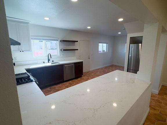 Bright and Spacious Kitchen with Brand New Appliances, Countertops, and Cabinets