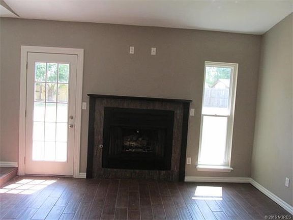 Newly re-tiled Fireplace