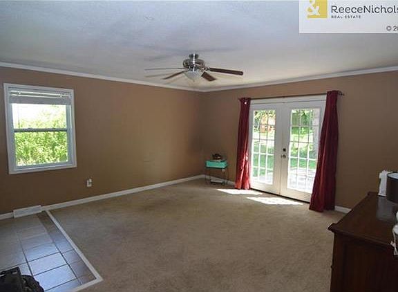 Living Room with beautiful french doors to backyard