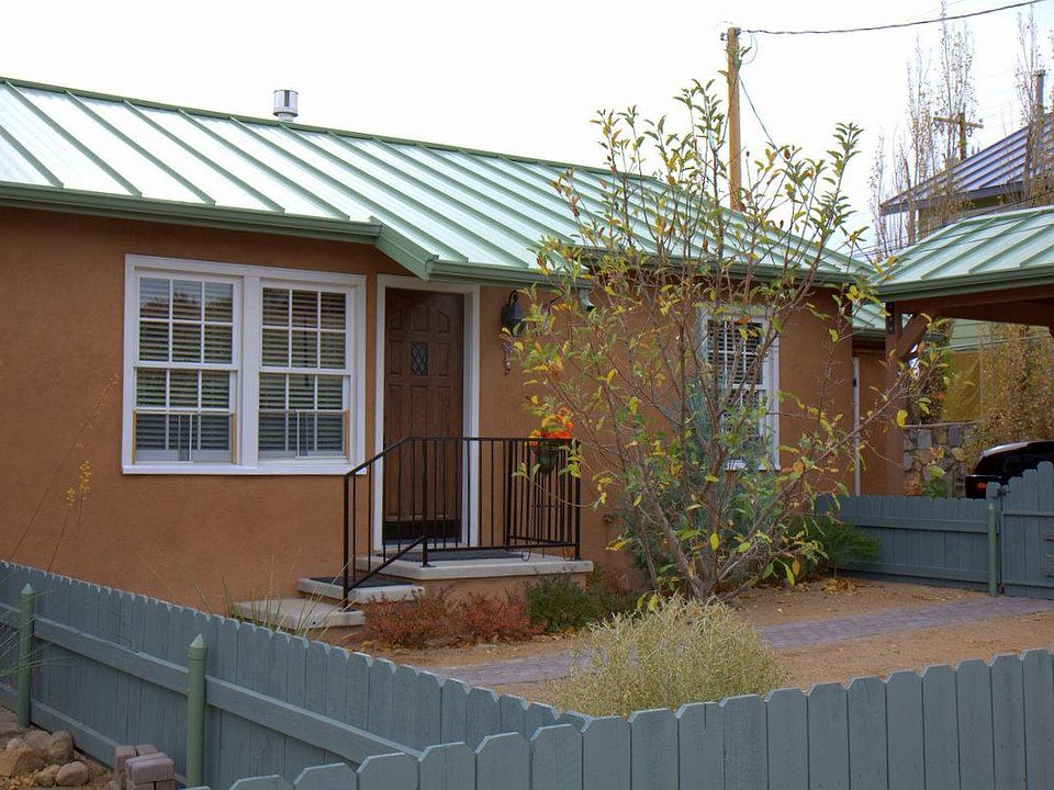 front door with adjoining car port