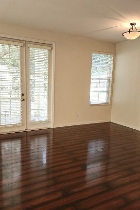 The front door and living room are looking out to Common Way Rd.