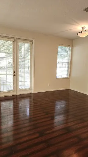 Great room view with the front French door's that leads out to Common Way Rd.