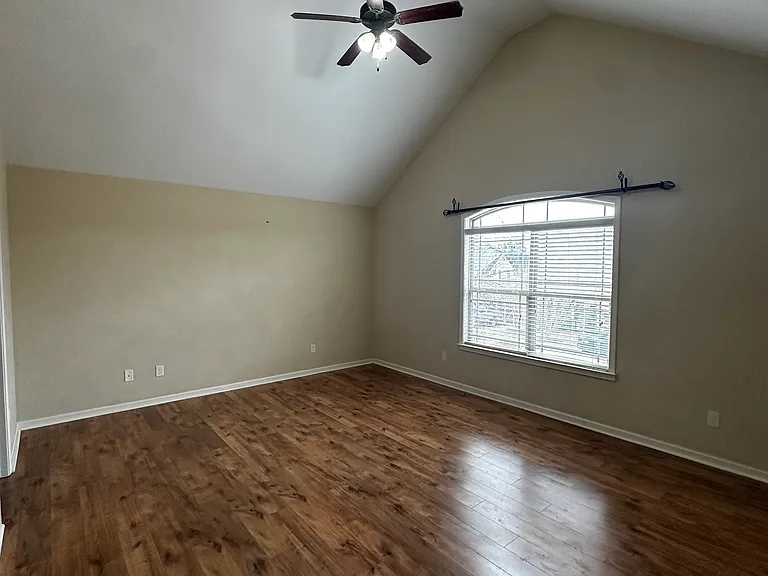 Primary bedroom, very spacious with high ceiling, large walking closet, private bathroom.