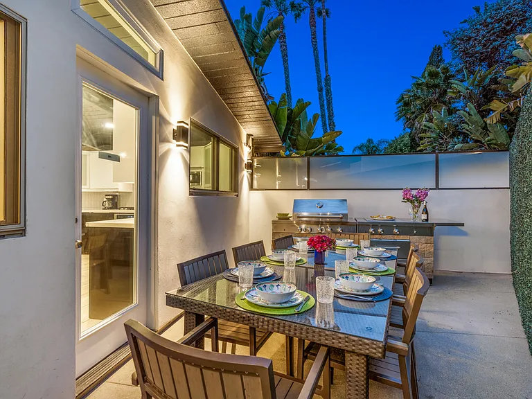 Outside Dining Area Off Of Kitchen With Bar-B-Que