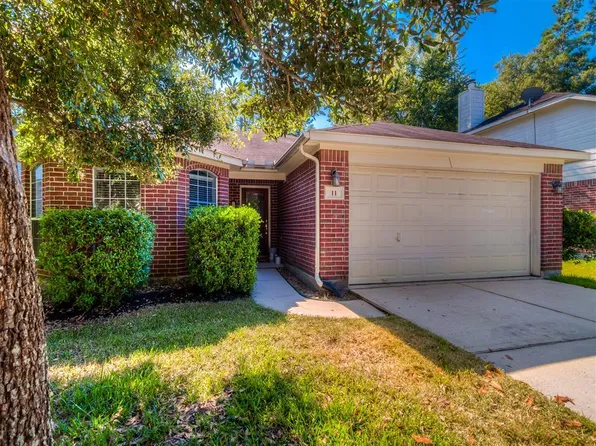 11 Rolling Ridge Ct, Conroe, TX 77385