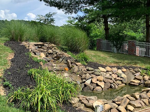 Koi pond with running water.