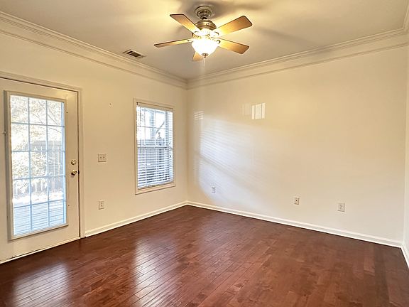 First floor bedroom with patio access.