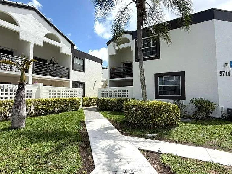 9711 Fontainebleau Blvd #D-105 — Photo 1