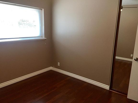 Upstairs middle bedroom .