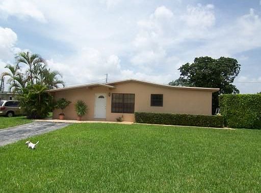 HUGE corner lot, 16,000 sq. ft. per owner, with private 8'00" high hedge 