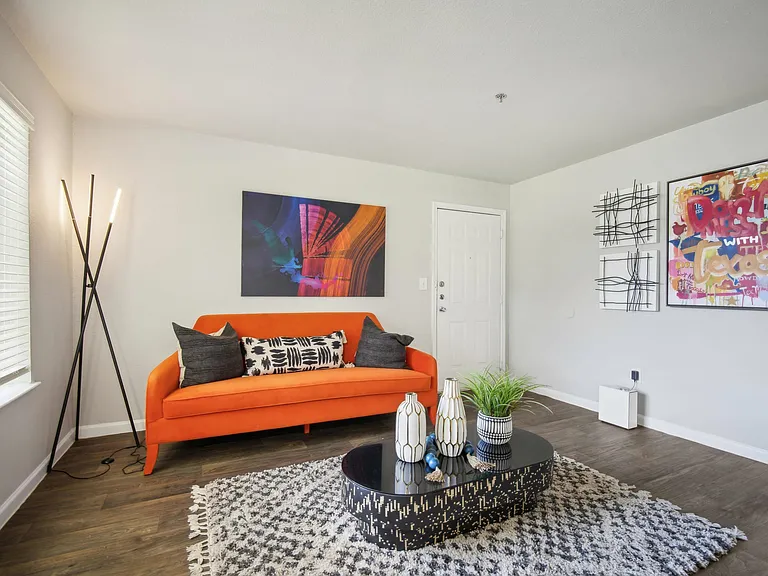 Stylish Living Area with Vibrant Furnishings at Ovation Apartments in Austin, TX