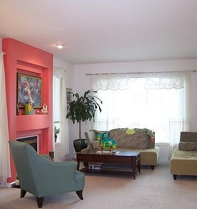 Formal living room is very inviting for your guests!