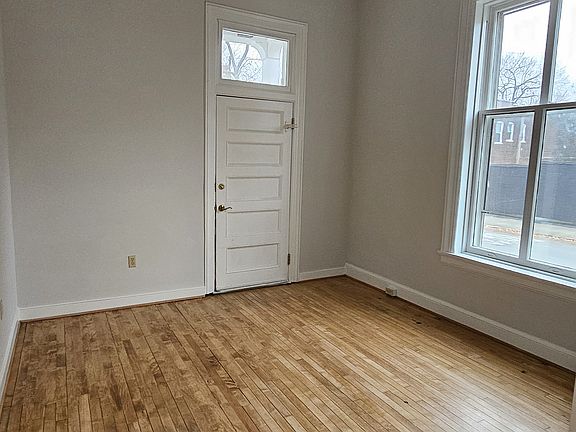 Living room leading to private porch.