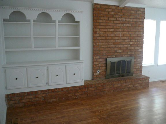 Living Room with built-ins and fireplace