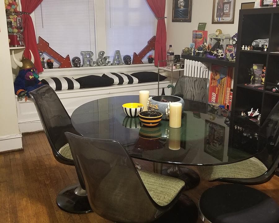 Dining room with arch and storage bench
