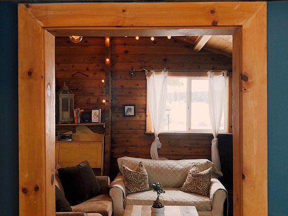 View from one side of cabin to the other (bedroom to living room)