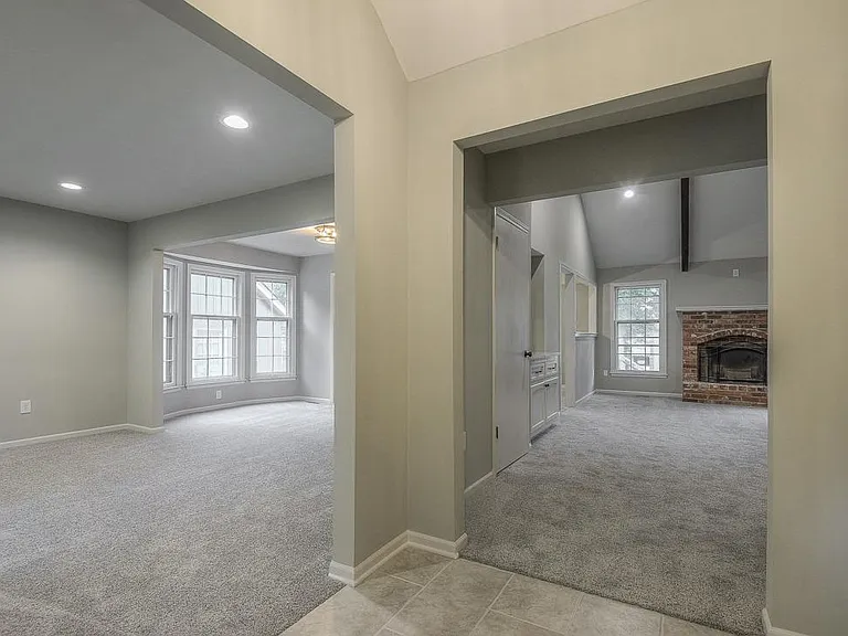 From the entry, easy flow into the living - dining area or into the family room / den.