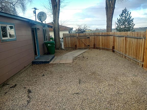 Large low maintenance fenced front yard, totally privacy onc