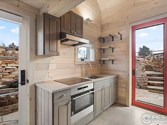 The fully stocked kitchen is ready for your recipes and groceries.