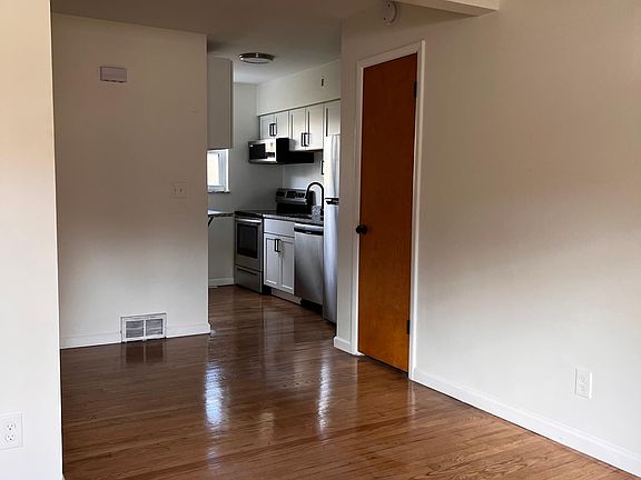 View from living room into kitchen area