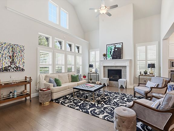Stunning High-Ceiling with Abundant Natural Light, opens effortlessly to adjacent living areas, offering a perfect footprint for everyday living or entertaining