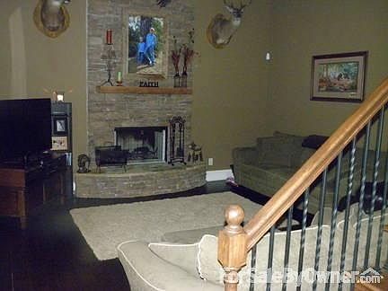 Greatroom
						:
						20 ft ceilings with stone fireplace & hearth. Hardwood floors,custom staircase.