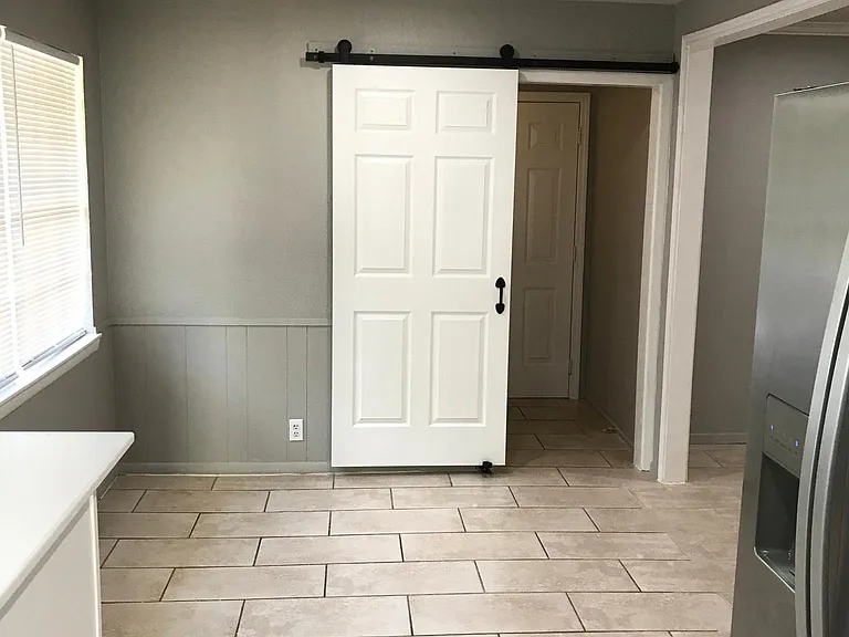 Eat in kitchen area. Door goes to laundry room and garage
