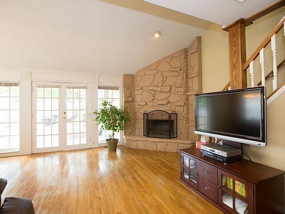 French Doors and Brick Fireplace