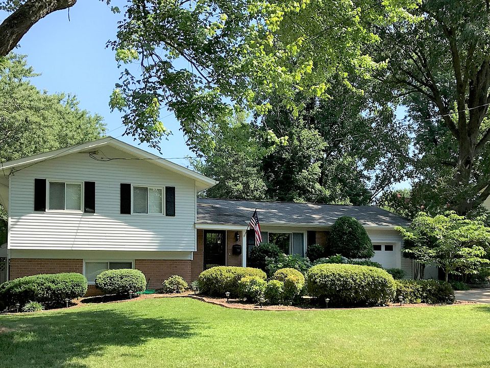 Front yard with garage and d
