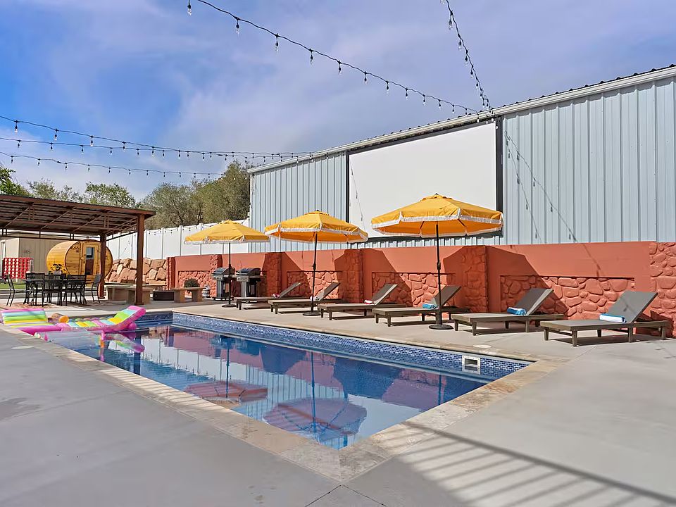 Here's what makes this place special: you get access to an amenity filled backyard with a swimming pool, outdoor theatre, ping pong table, turf lawn with games, a playground, firepit and a cedarwood sauna. All available for your use.