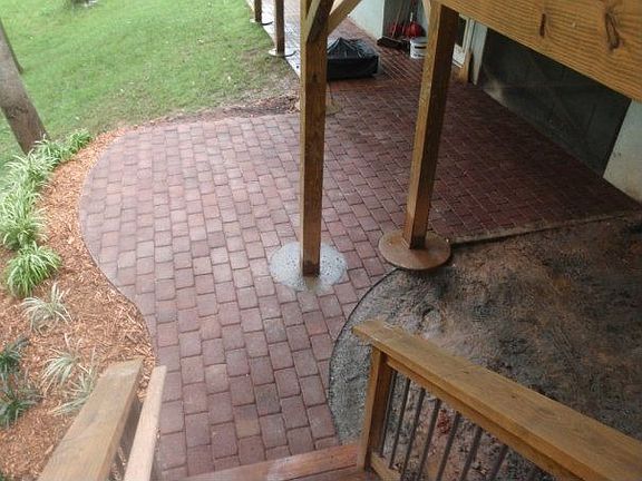 Brick patio under deck