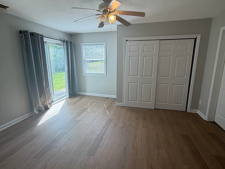 Primary bedroom with walkout, large closet and en suite bathroom
