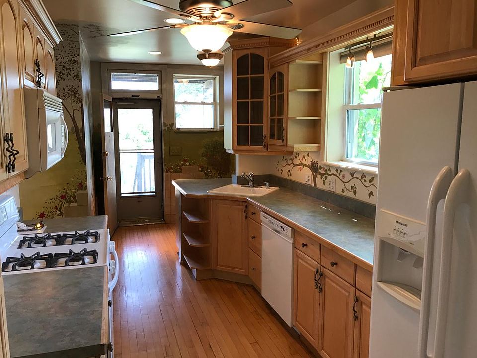 Light filled kitchen opens out to deck