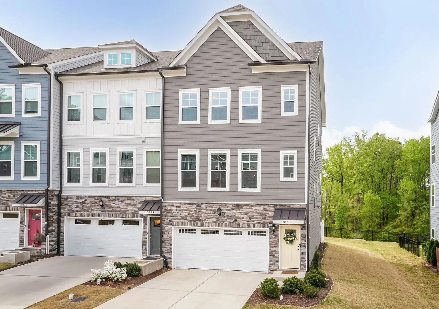 End Unit Townhome in West Village | Apex — Photo 1