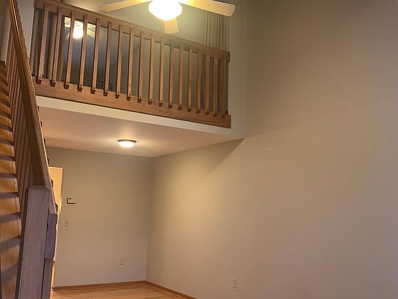 The skylights and gleaming hardwood floors run throughout
