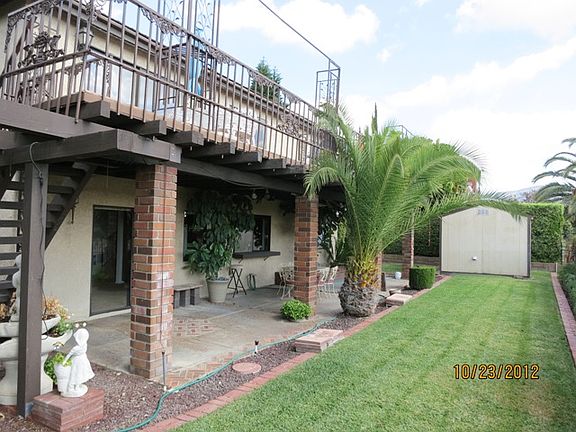 Back yard with patio/balcony