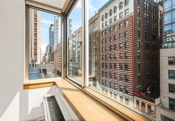 5th image of 35 W 33rd St APT 5E